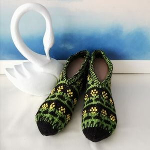 Handmade knitted slipper. New